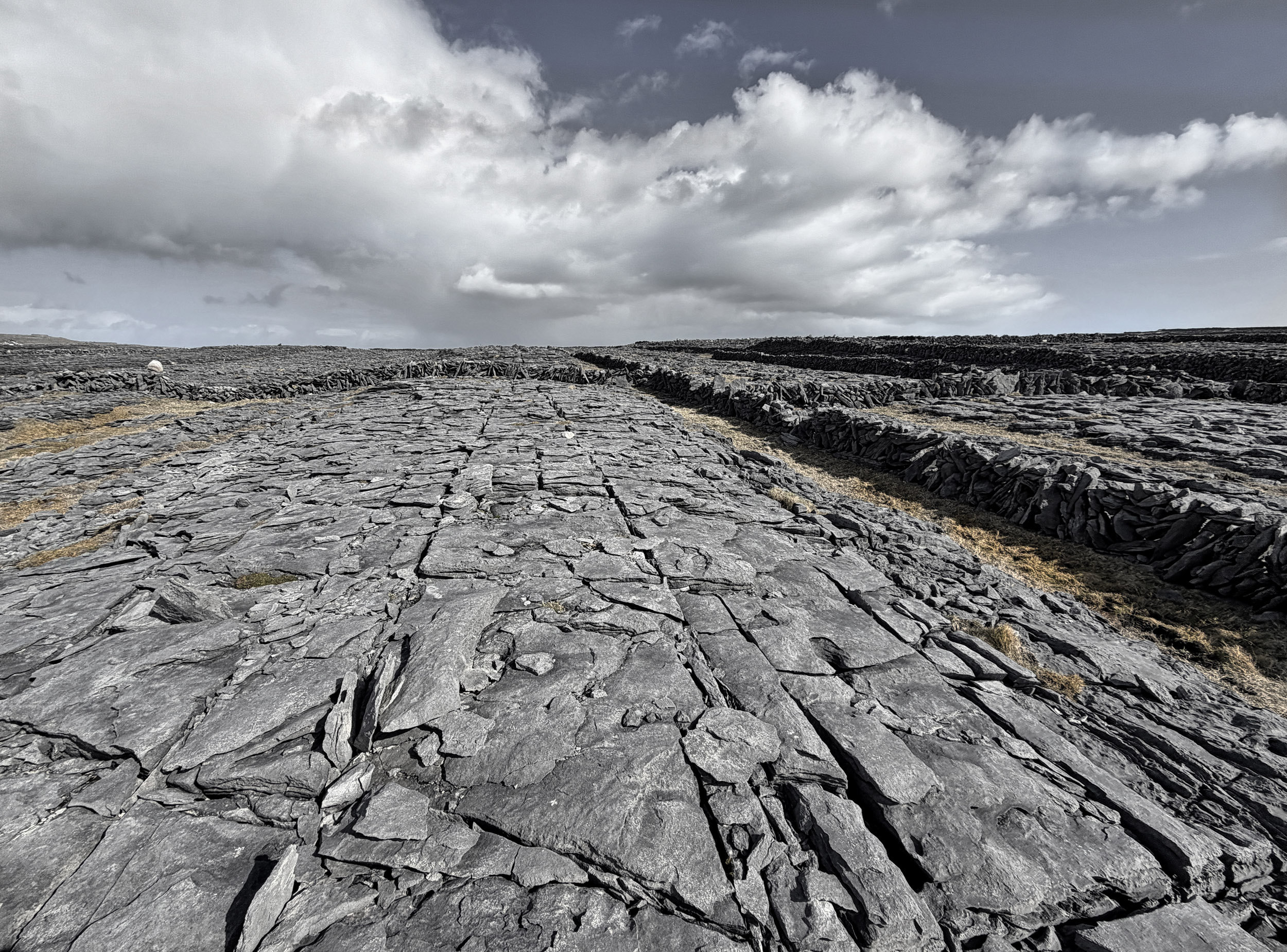 View southeast of limestone karst toward Dun Duchathair on Inishmore, County Galway