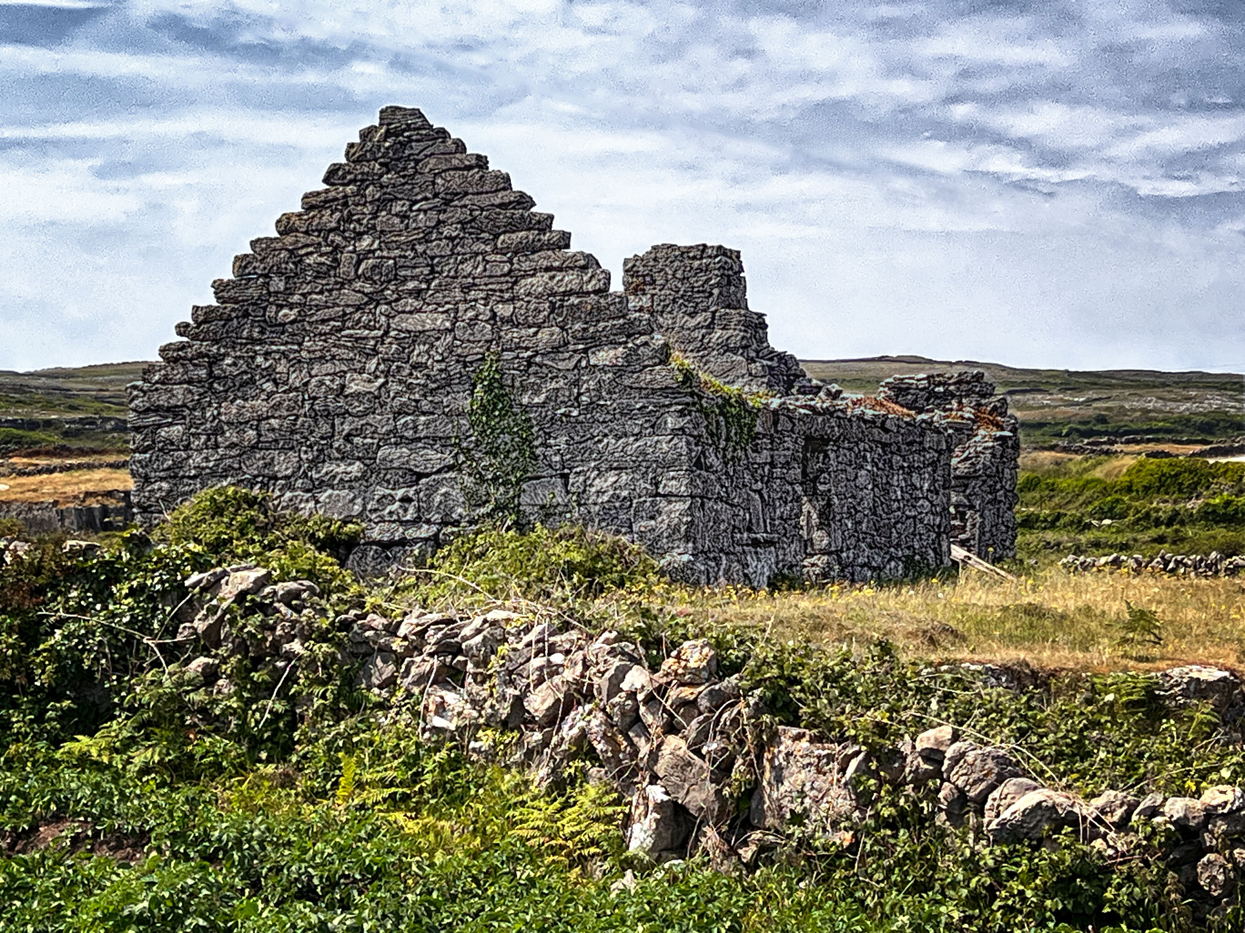 Once a home to sturdy families, a stone cottage now lies in forgotten ruins on Inishmore, County Galway