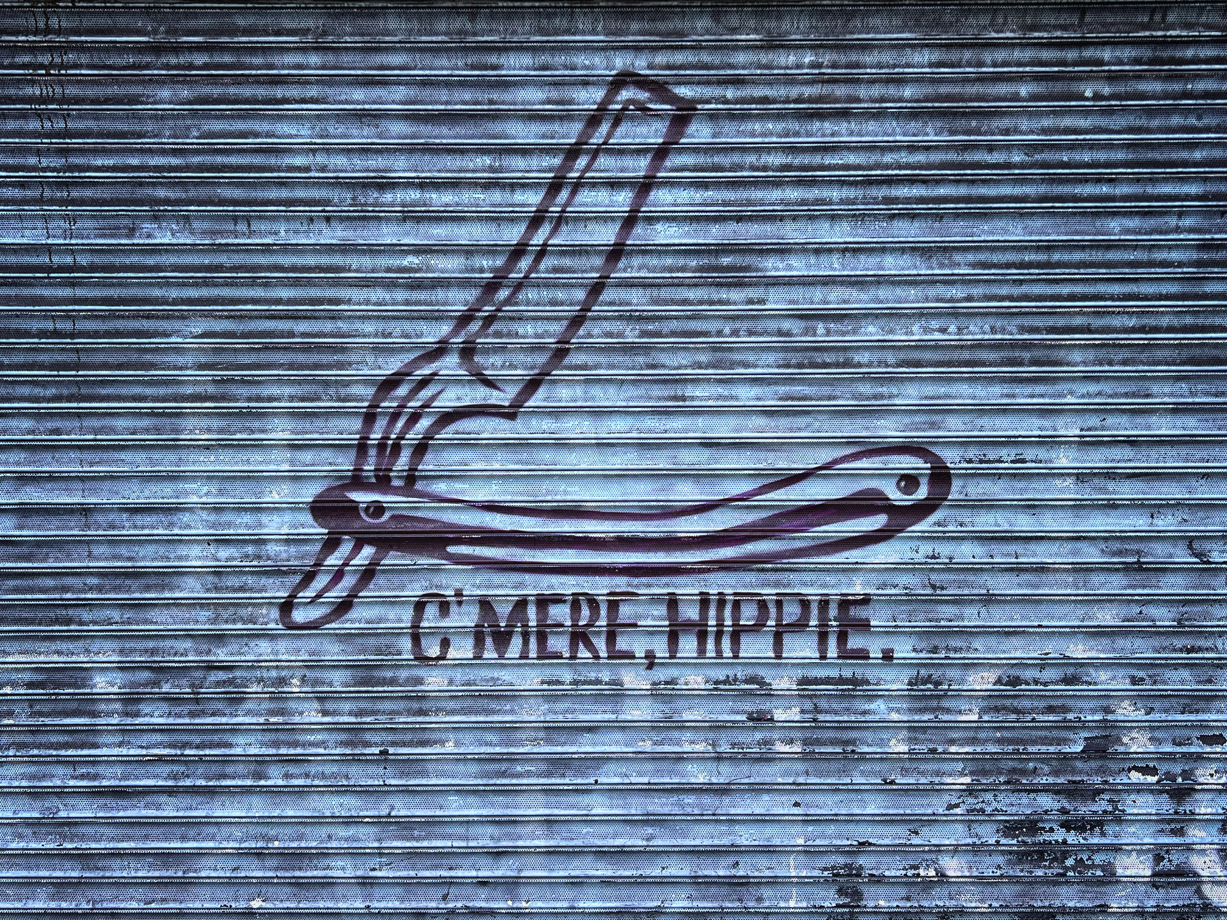 A straight razor and a dare — barbershop shutter, College Street, Dublin, County Dublin